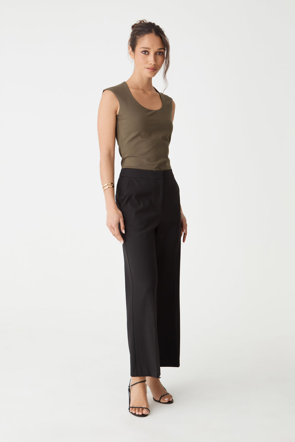 Side view of the mocha brown top showing fitted silhouette