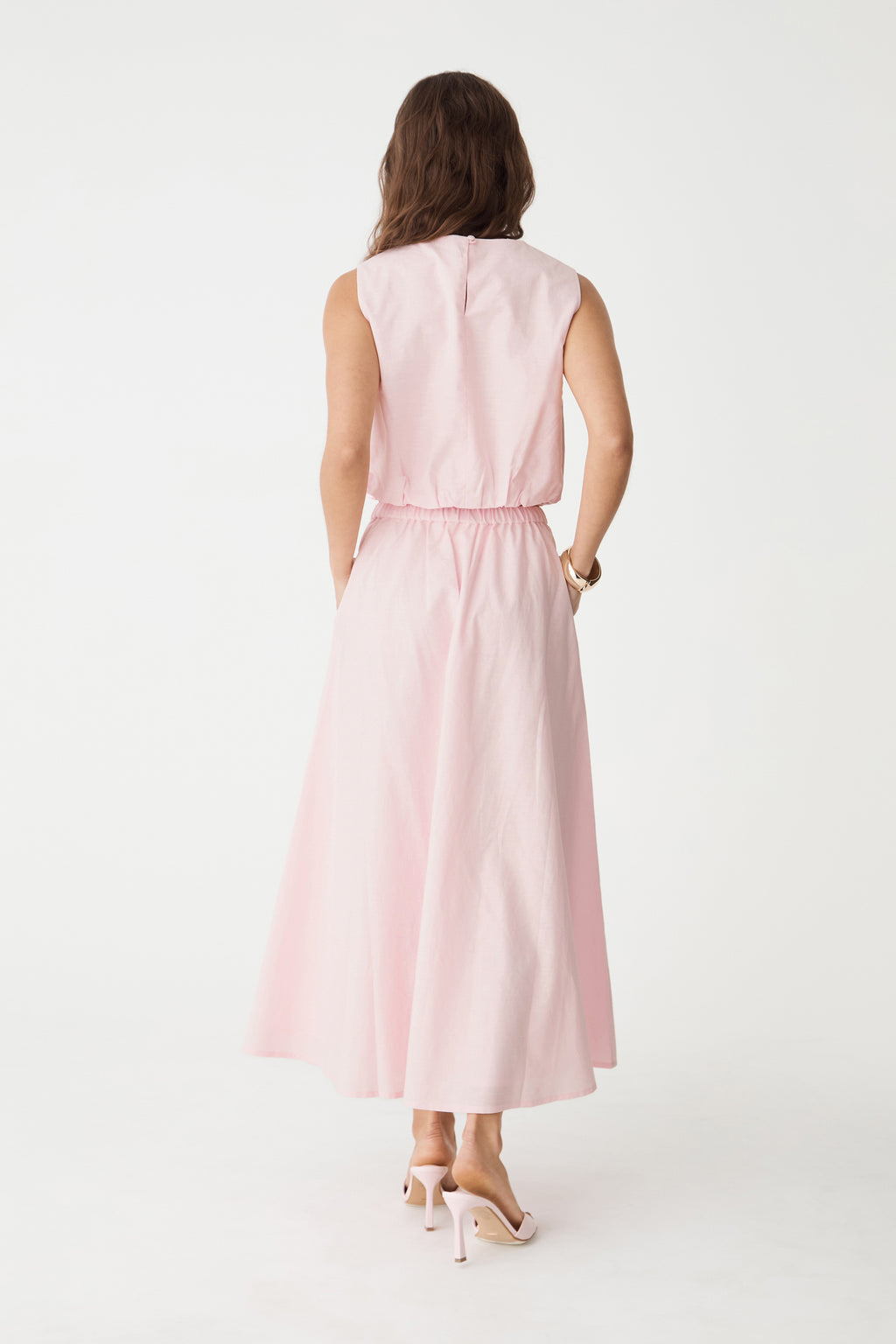 Back view of the Fairy Floss pink midi skirt with matching top