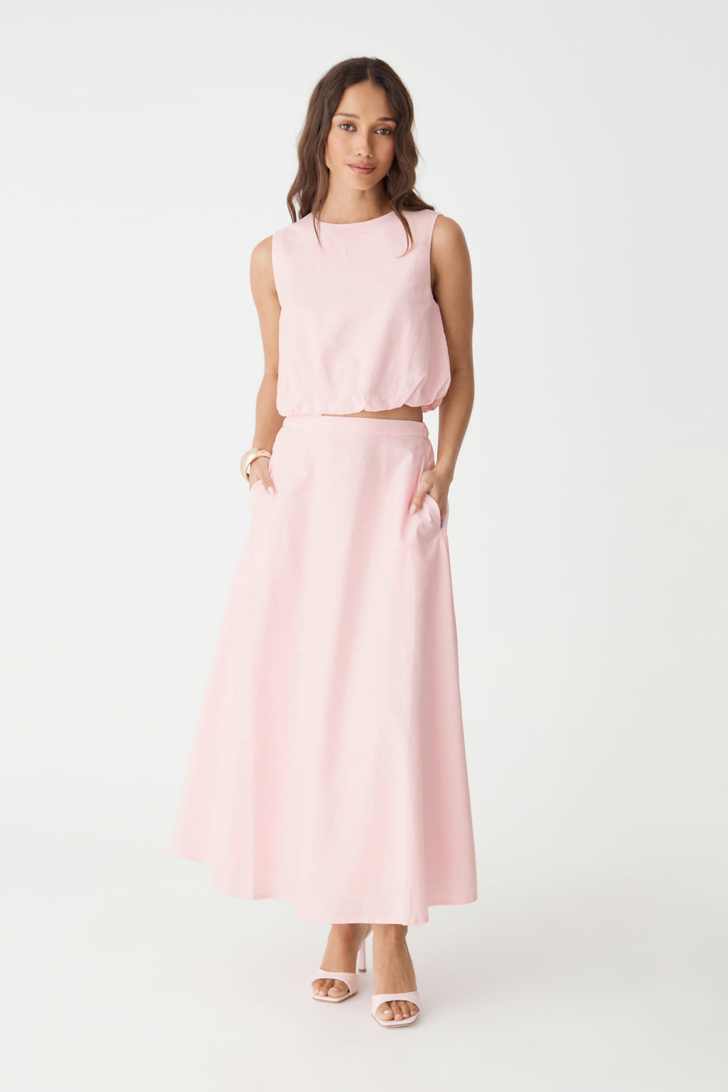Kenya Linen Skirt in Fairy Floss pink, front view, worn with matching sleeveless top