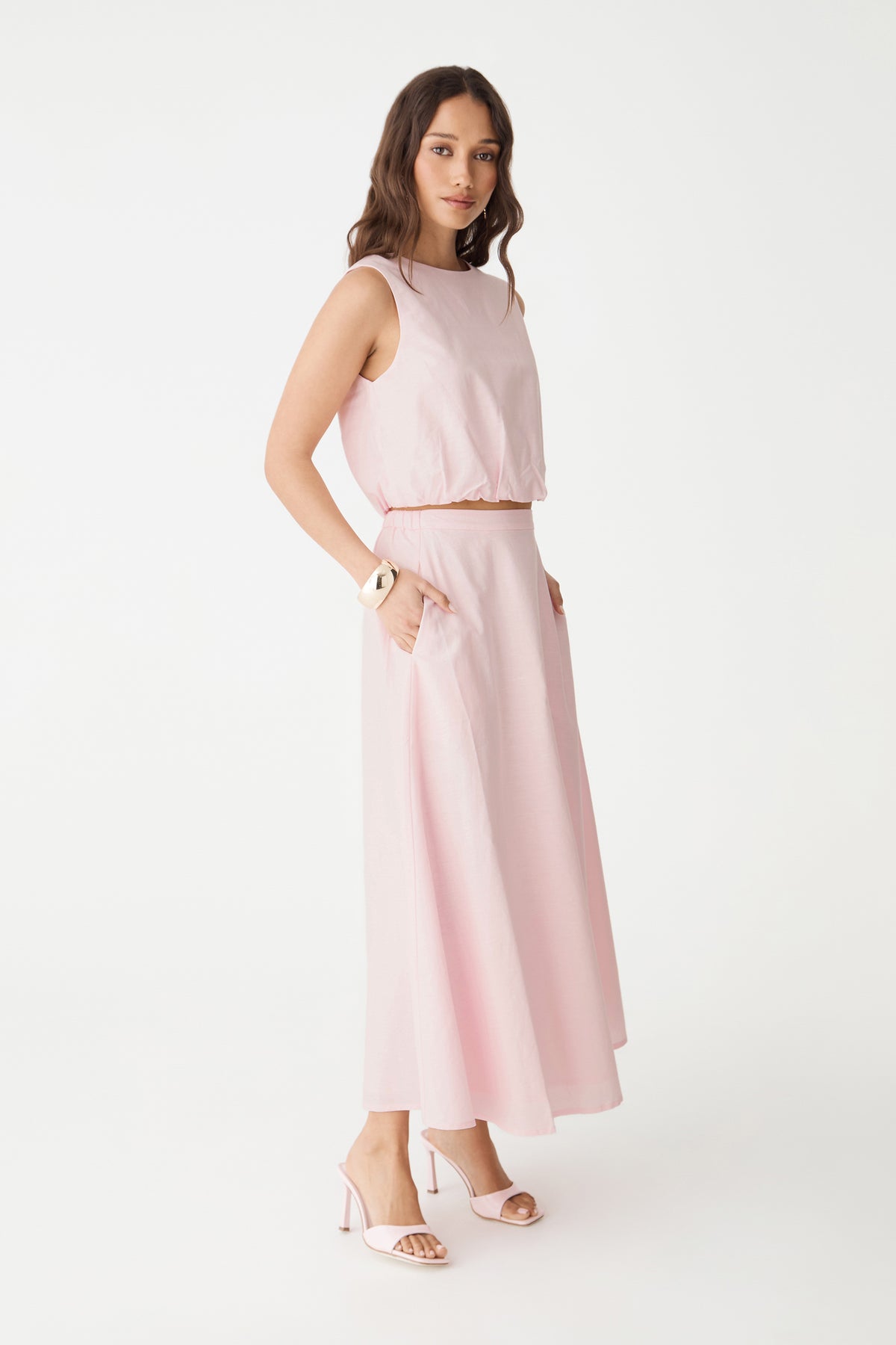Side view of the Fairy Floss pink linen skirt and matching top