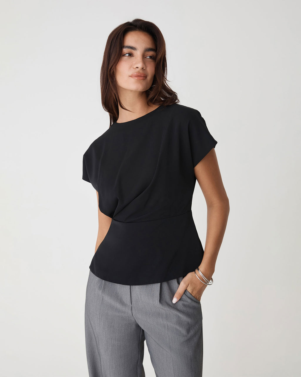 Bonnie Gathered Peplum Top in black — close-up view 2