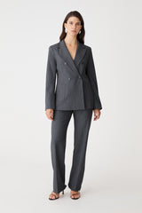 Merid Double Breasted Blazer in dark grey, front view worn with matching tailored pants