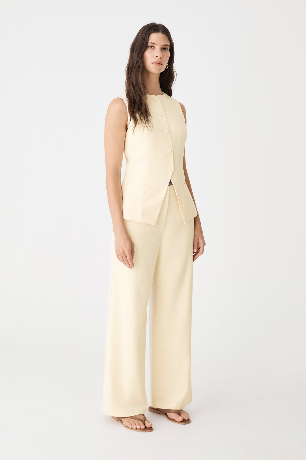 Side view of the butter wide leg pants with matching vest