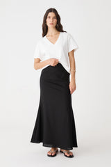 Amelia Linen Blend Maxi Skirt in black, front view worn with a white V-neck tee