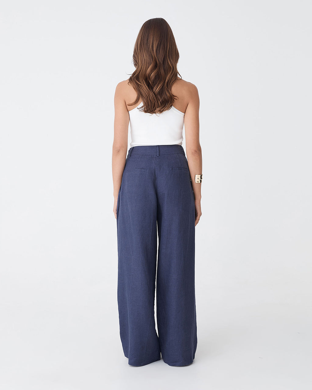 Ami Wide Leg Linen Pants in wash navy — back view