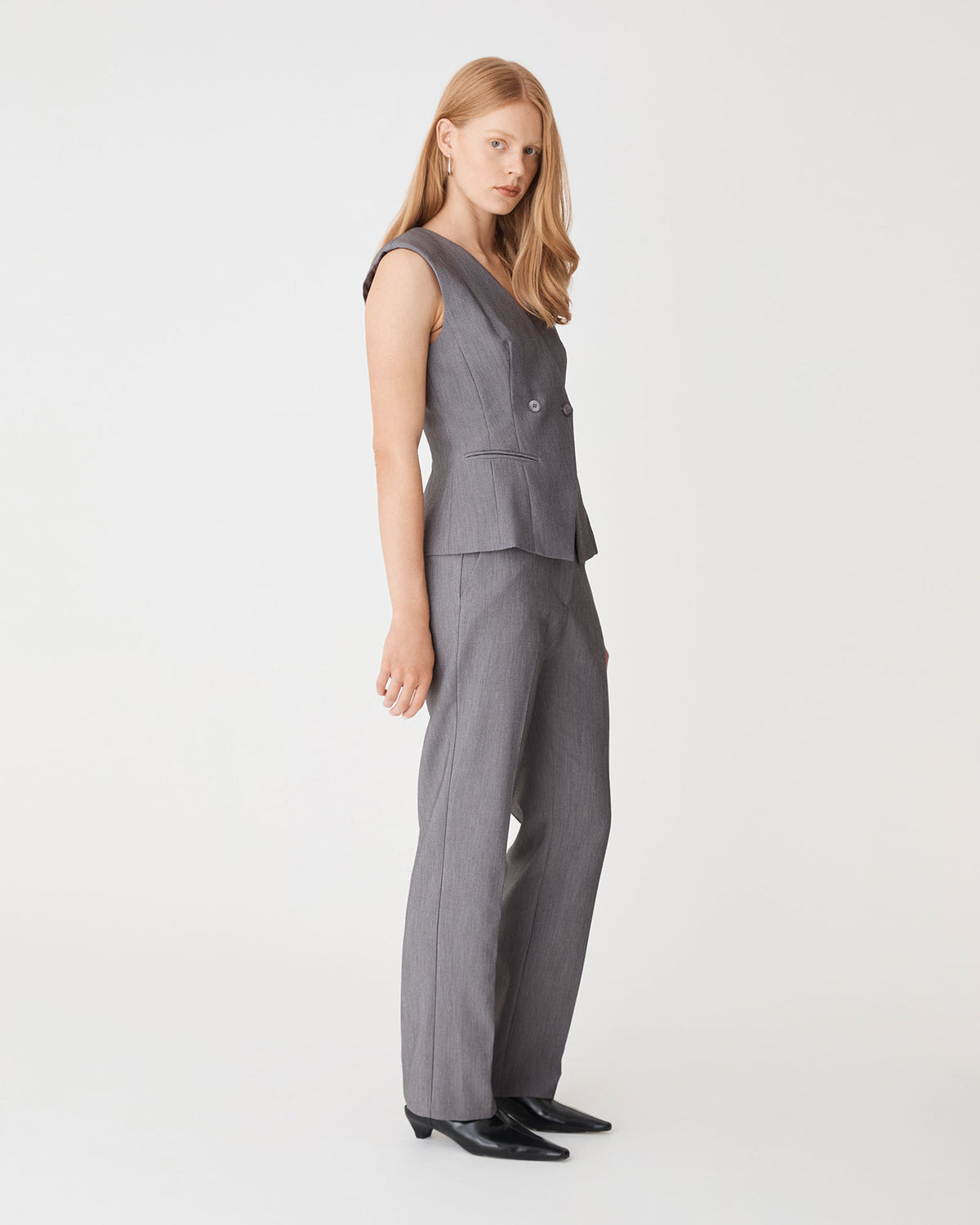 Nikki Collarless Vest in melange grey — side view