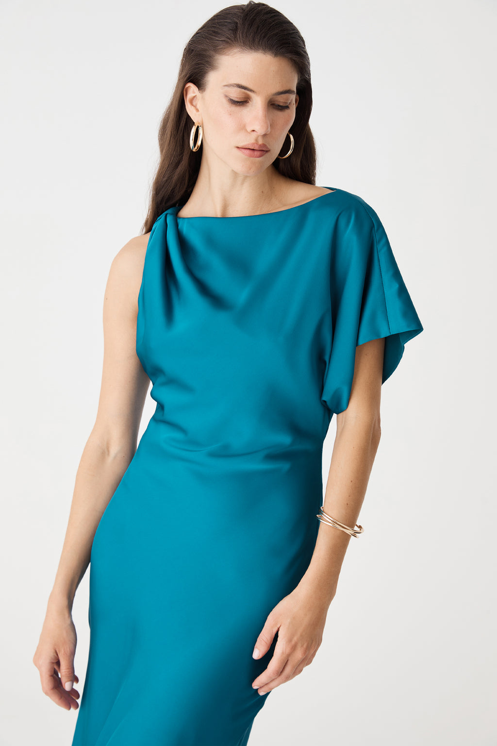 Close-up of bodice and boat neckline, showing draped flutter sleeve