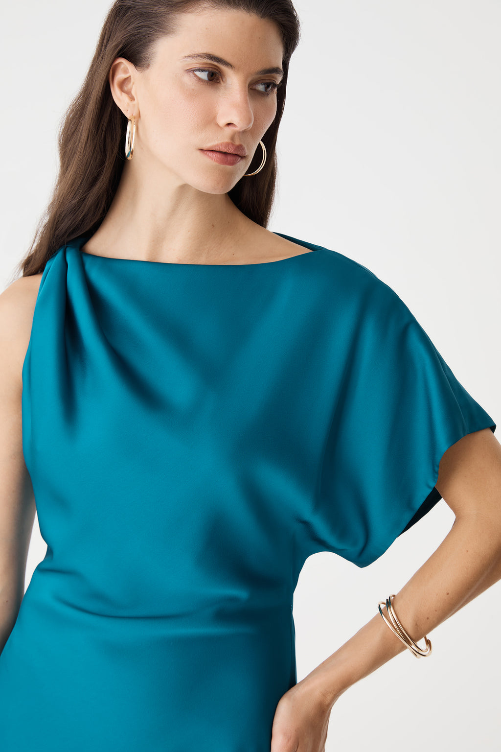 Detail of gathered shoulder and bare right shoulder