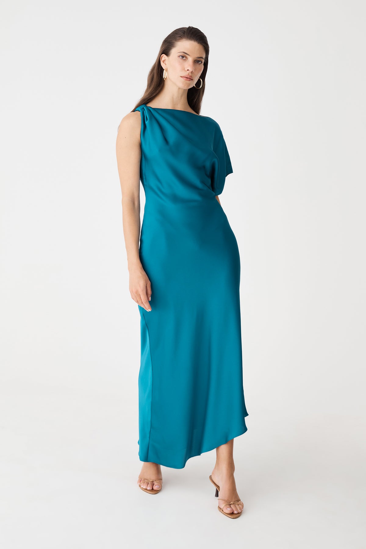 Front view showing asymmetric high-low hemline