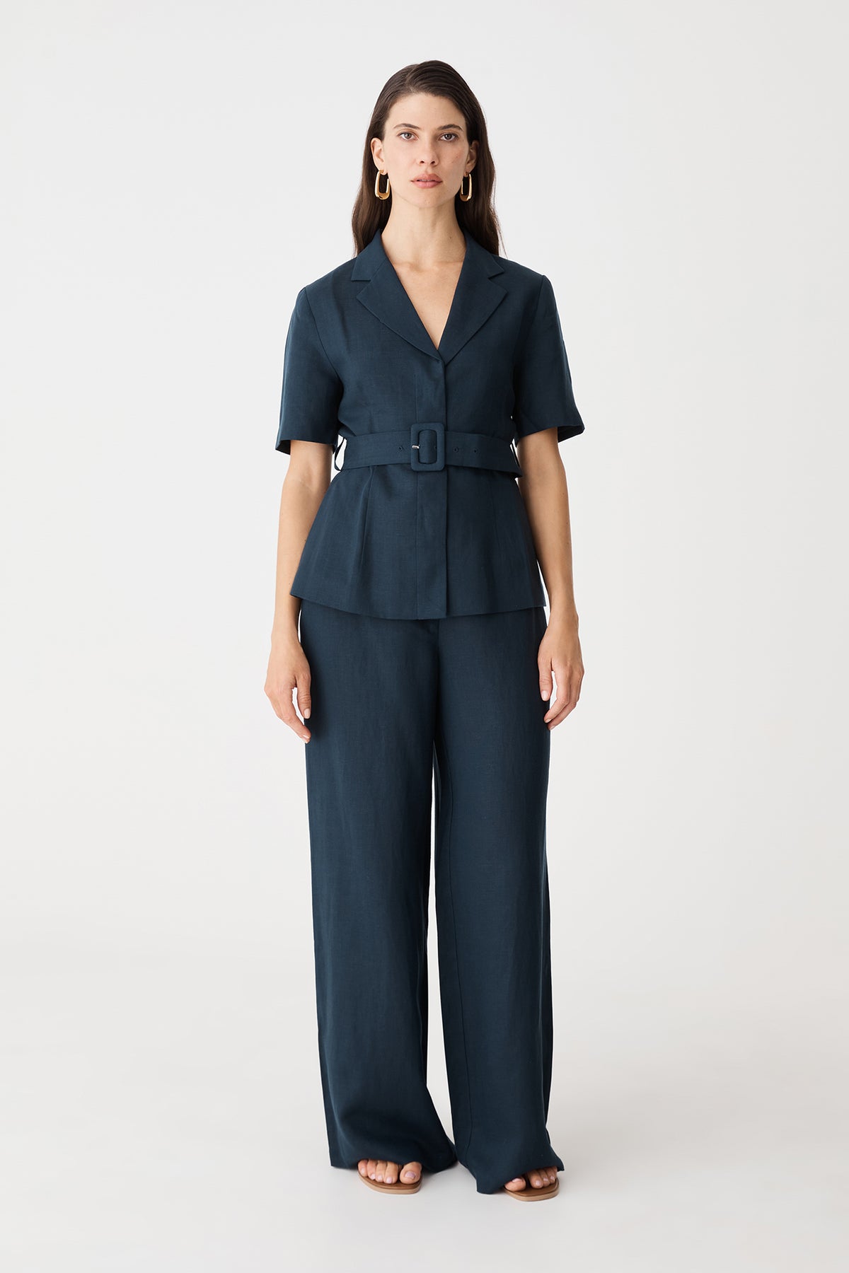 Phoebe Linen Lyocell Blazer in navy, front view with belted waist, worn with matching wide-leg trousers