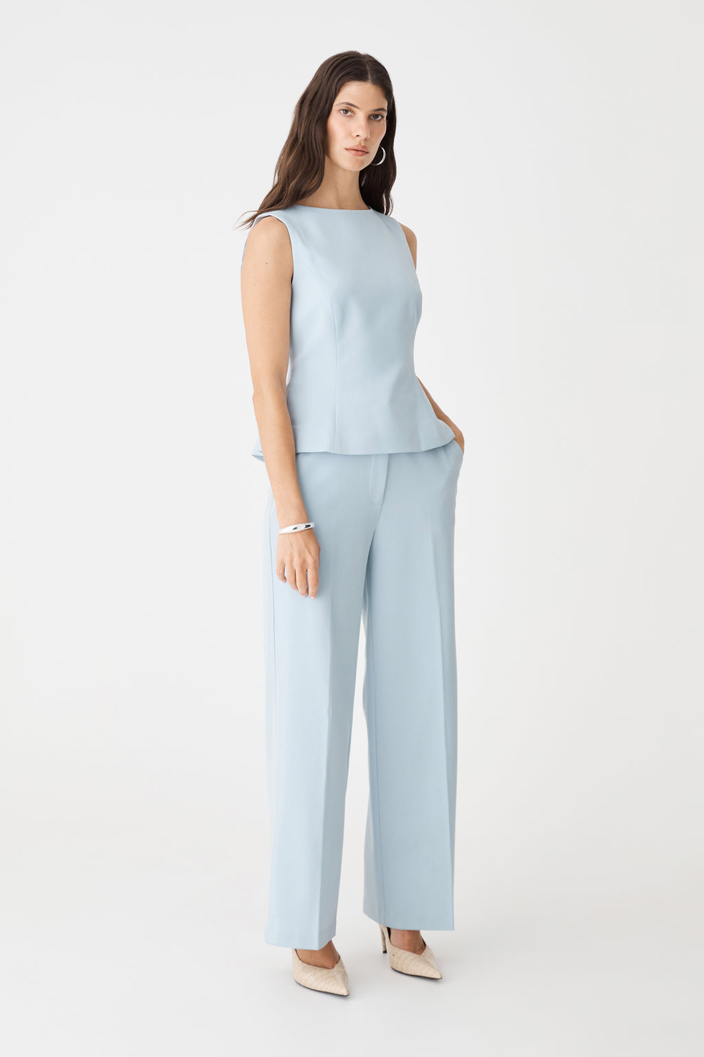 Side view of the sky blue Melanie Straight Leg Pants with matching tailored top