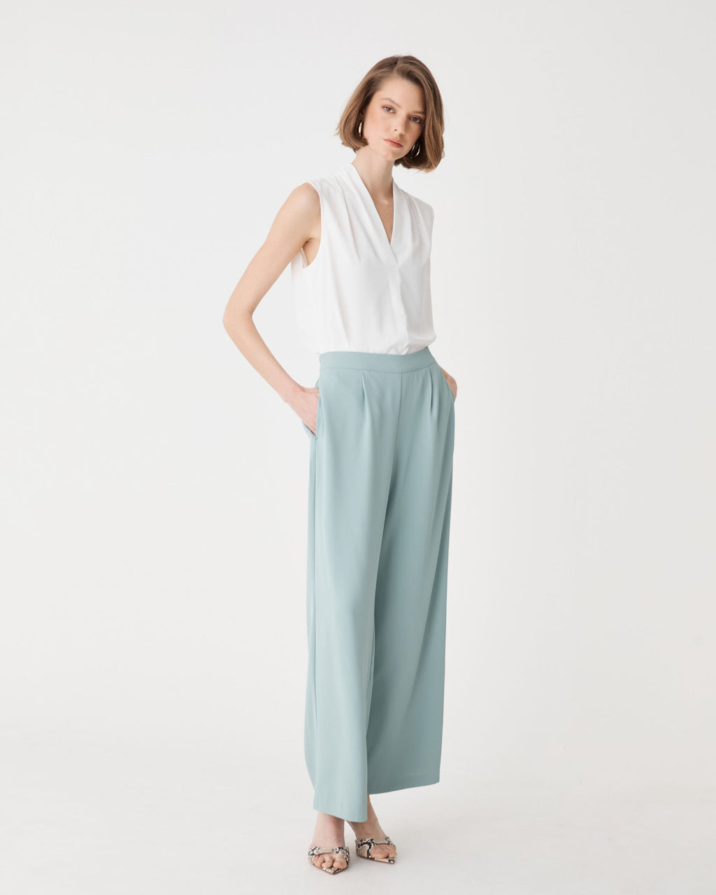 Side view of the Maggie Elastic Waist Pants in Eucalyptus showing the wide leg drape