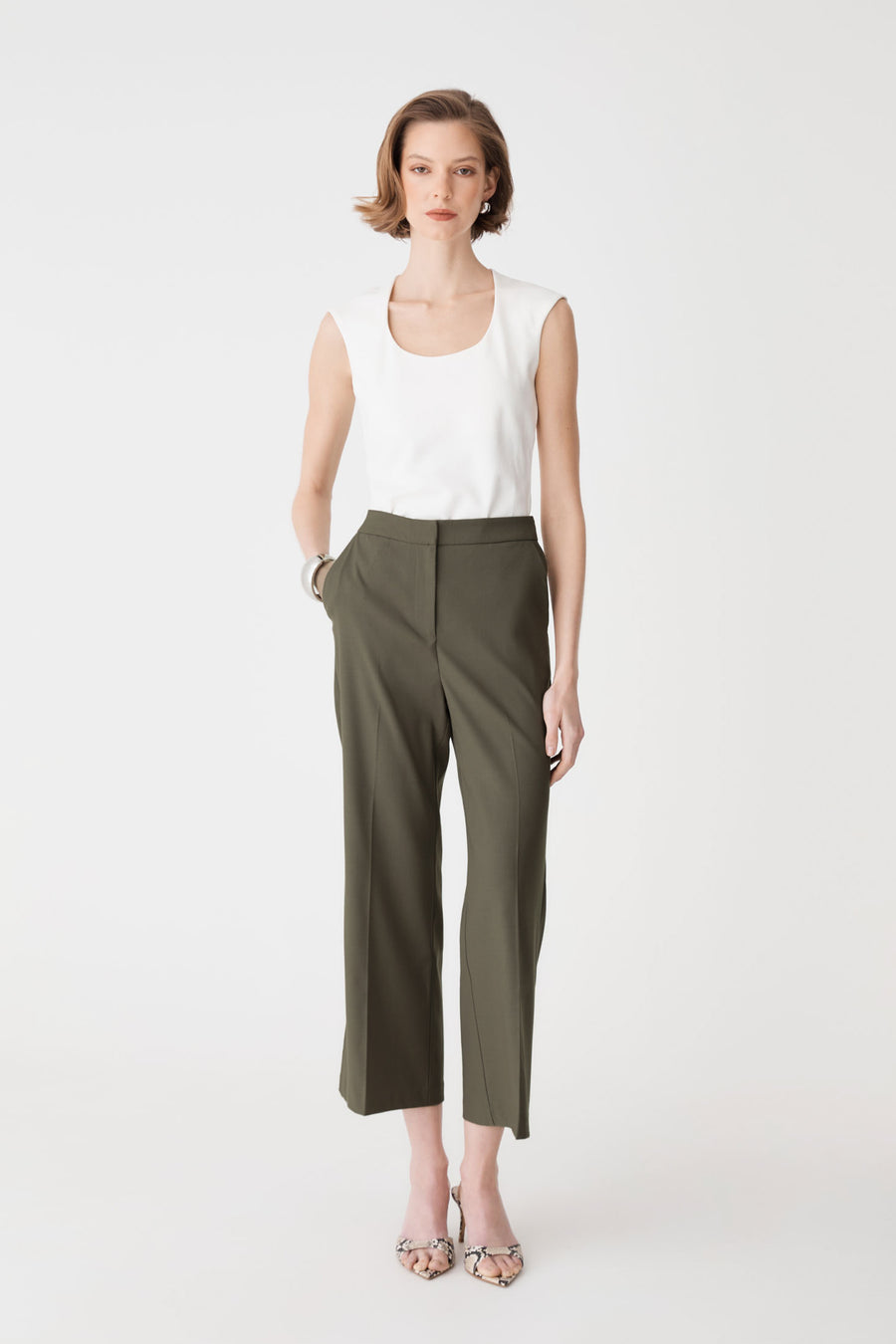 Milan Crop Flare Pants in khaki, front view worn with a white sleeveless top