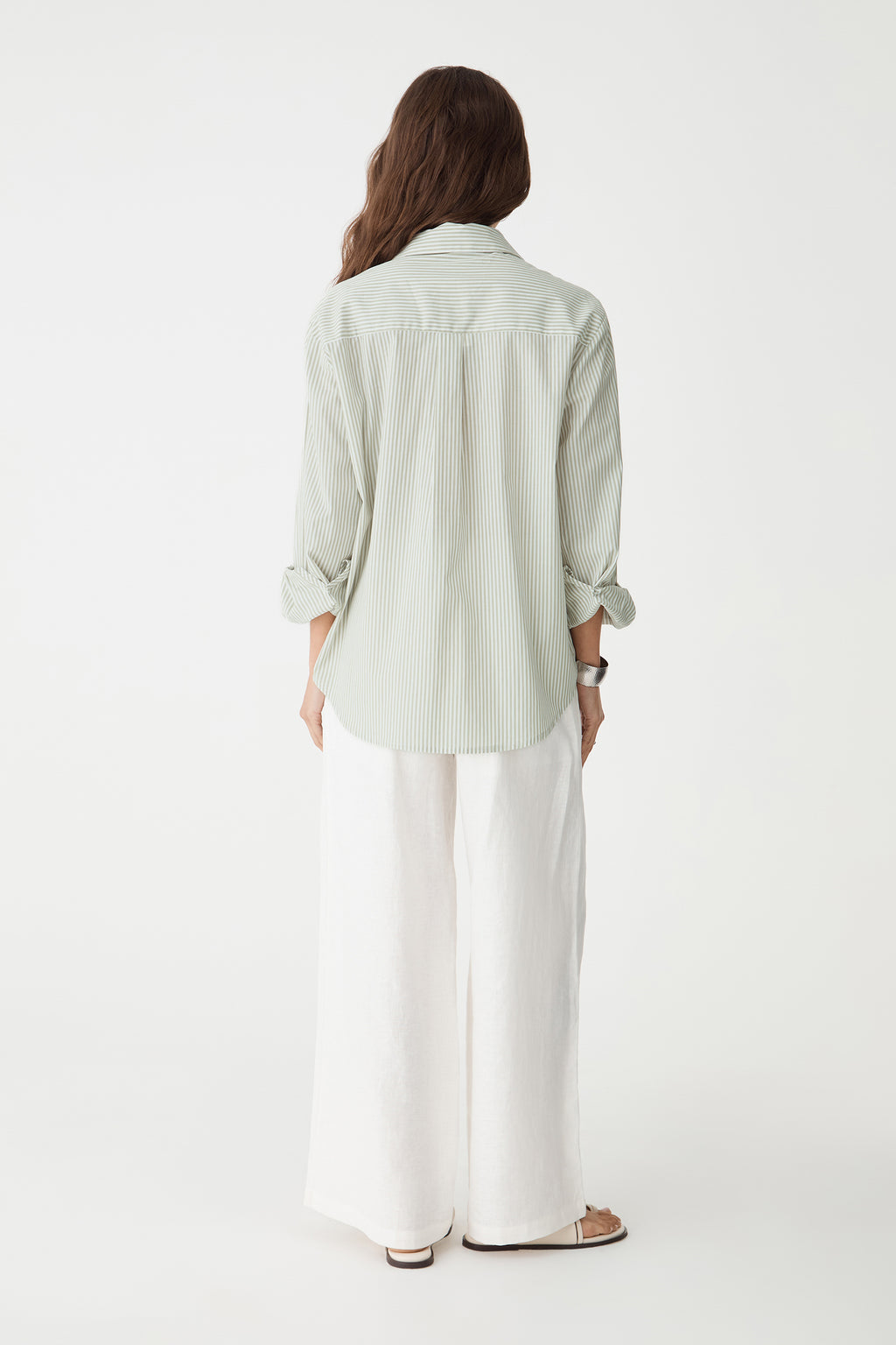 Back view showing the shirred elasticated back waistband of the ivory pants