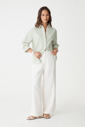 Ami 2 Linen Elastic Back Pants in ivory, front view worn with a pale green shirt