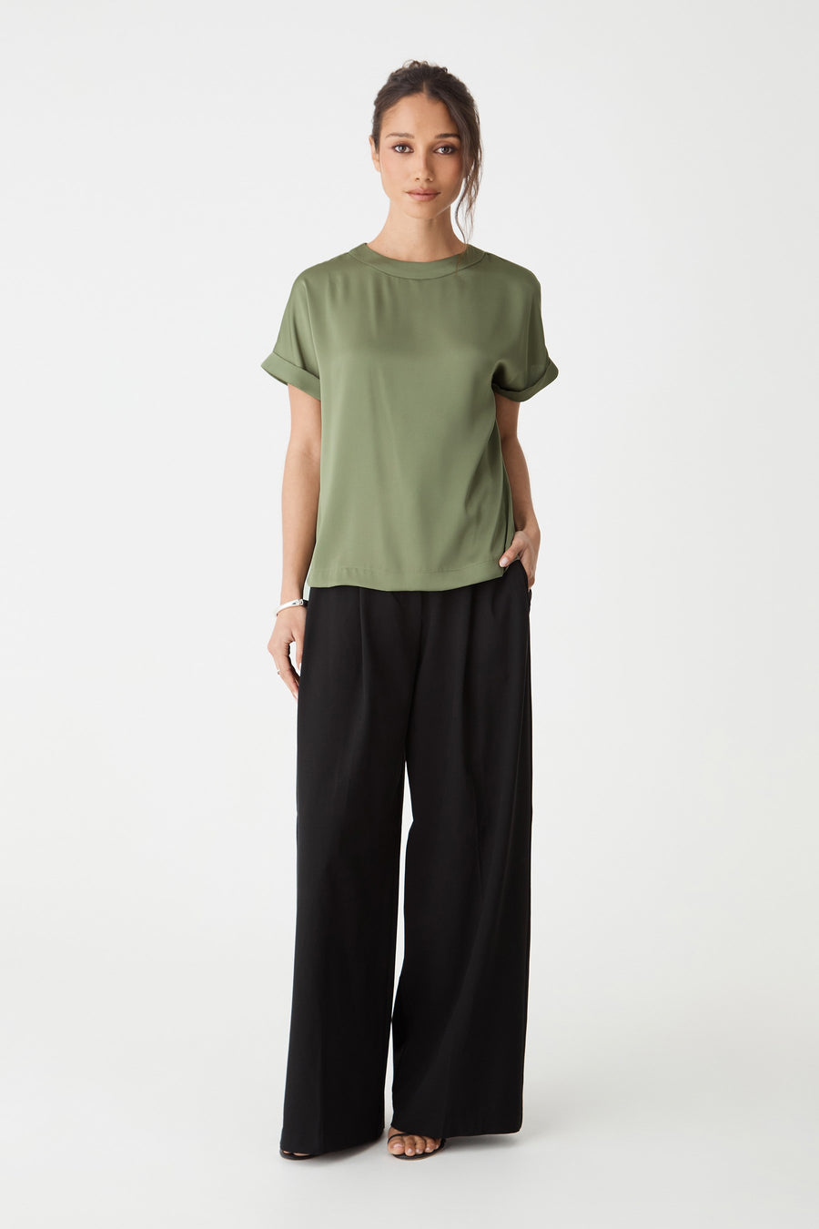 Cameron Satin Tee in soft khaki, front view worn with black wide-leg trousers