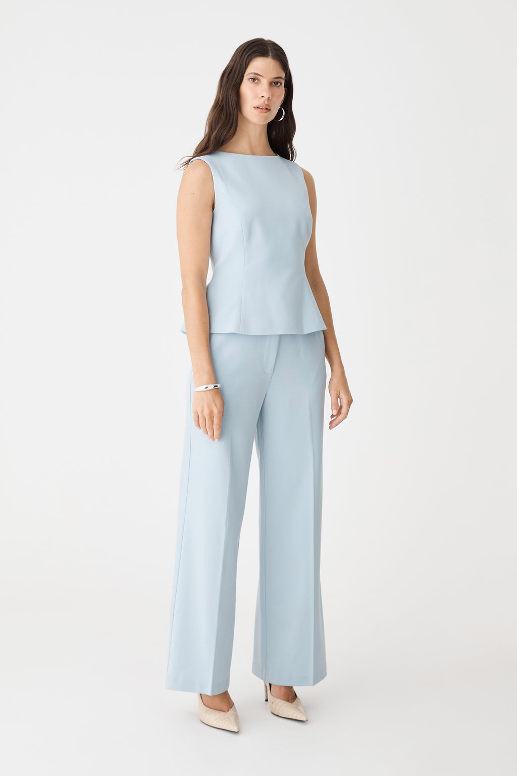 Side view of the sky blue Melanie Tailored Top with matching pants