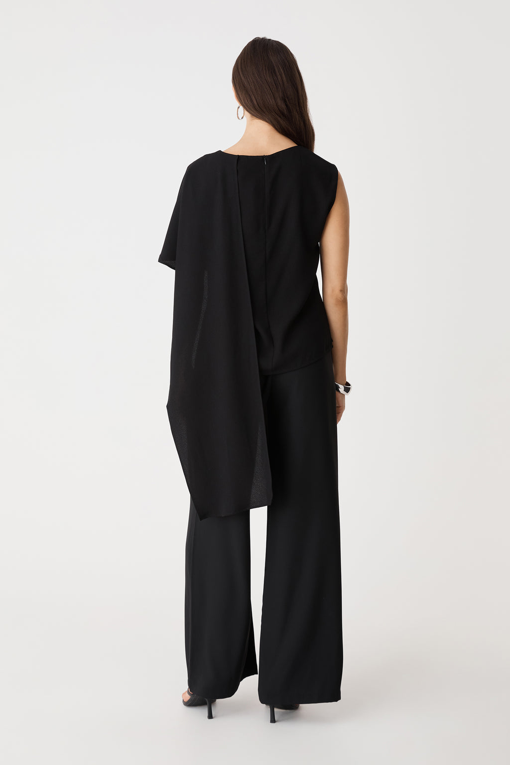 Back view showing the cape overlay and invisible back zipper