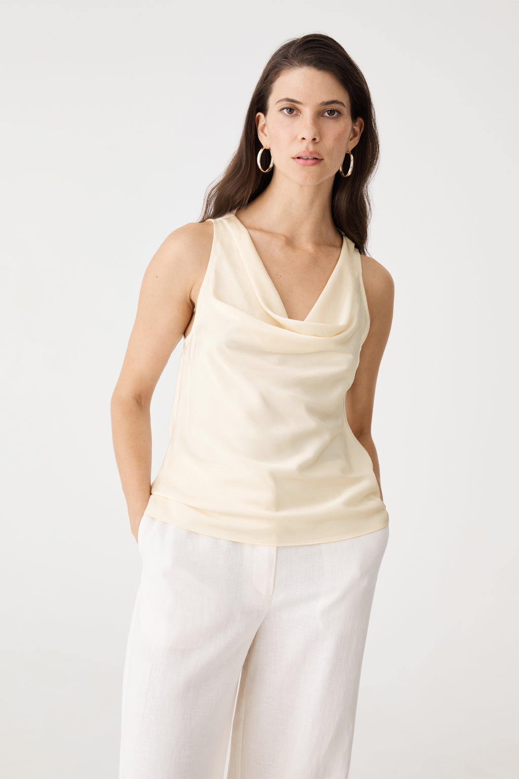 Aurelia Satin Cowl Neck Top in champagne, front view worn with white wide-leg trousers