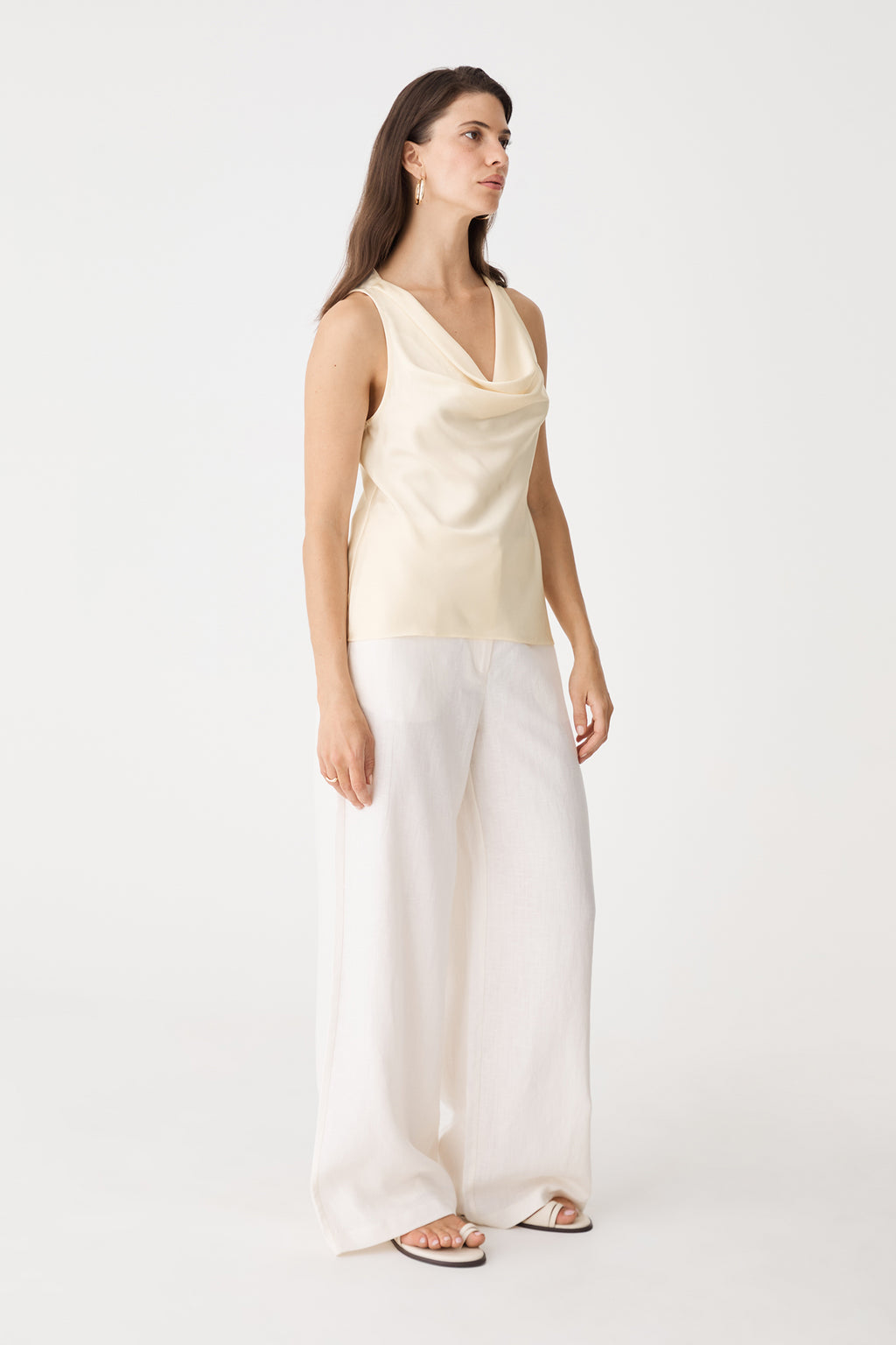 Side view showing the fluid drape and slight flare at the hem