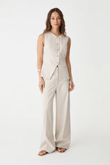 Zoe Pinstripe Vest in beige pinstripe, front view worn with matching wide-leg trousers