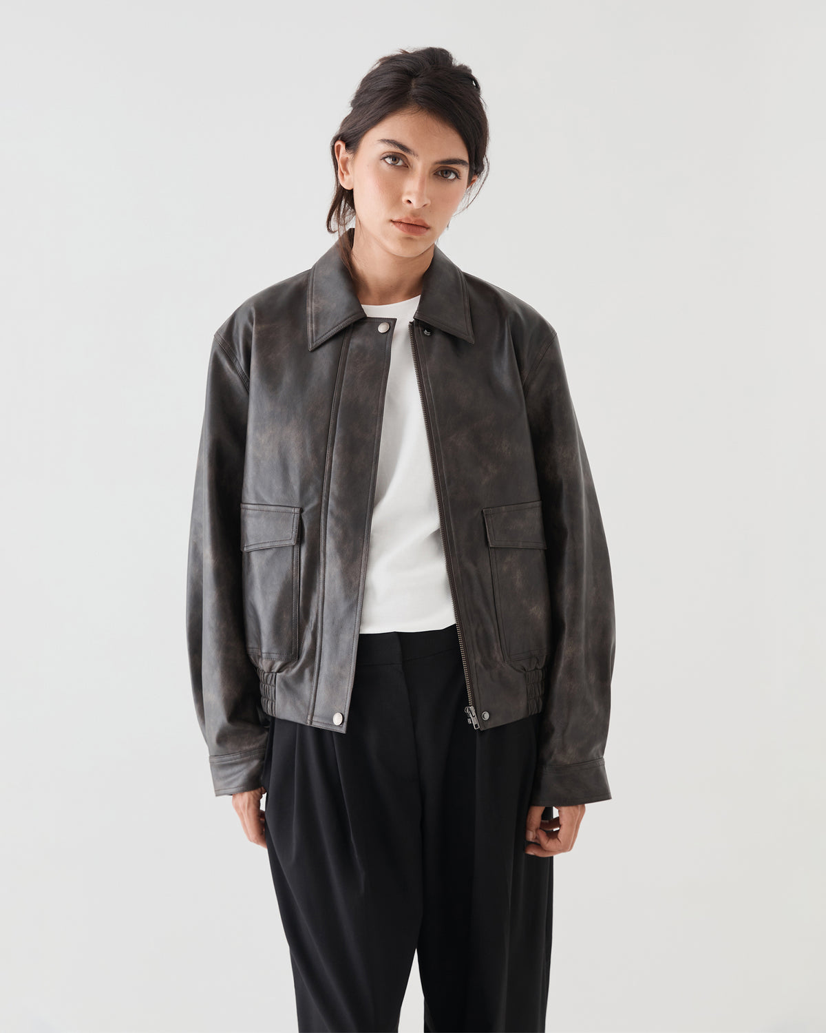Ada Faux Leather Bomber Jacket in dark brown — close-up view