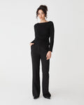 Calia Asymmetric Knit Top in black — full-length view