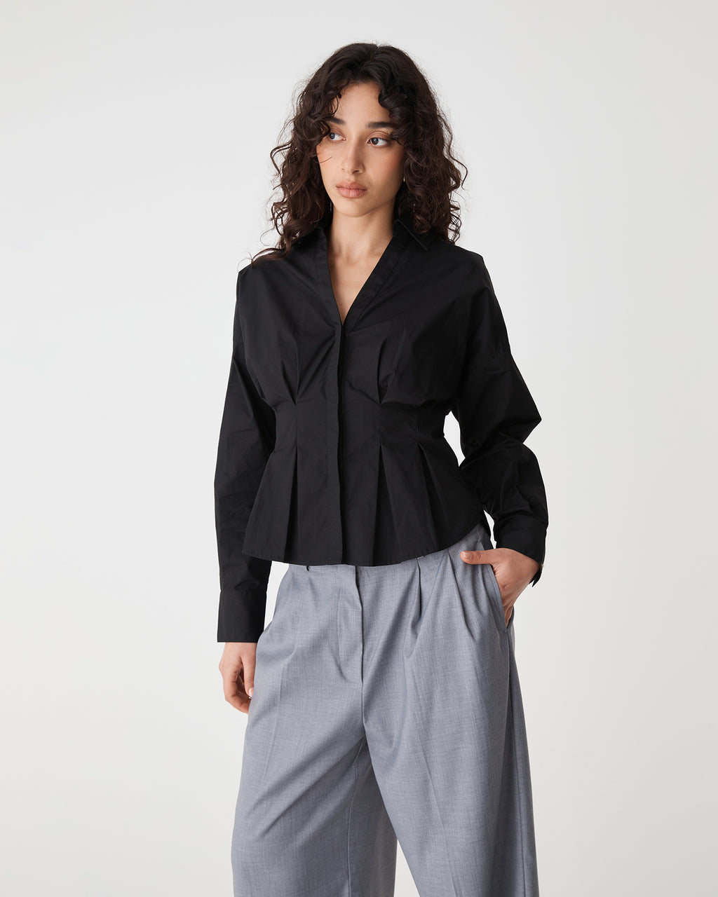 Billie Pleat Waist Shirt in black — close-up view