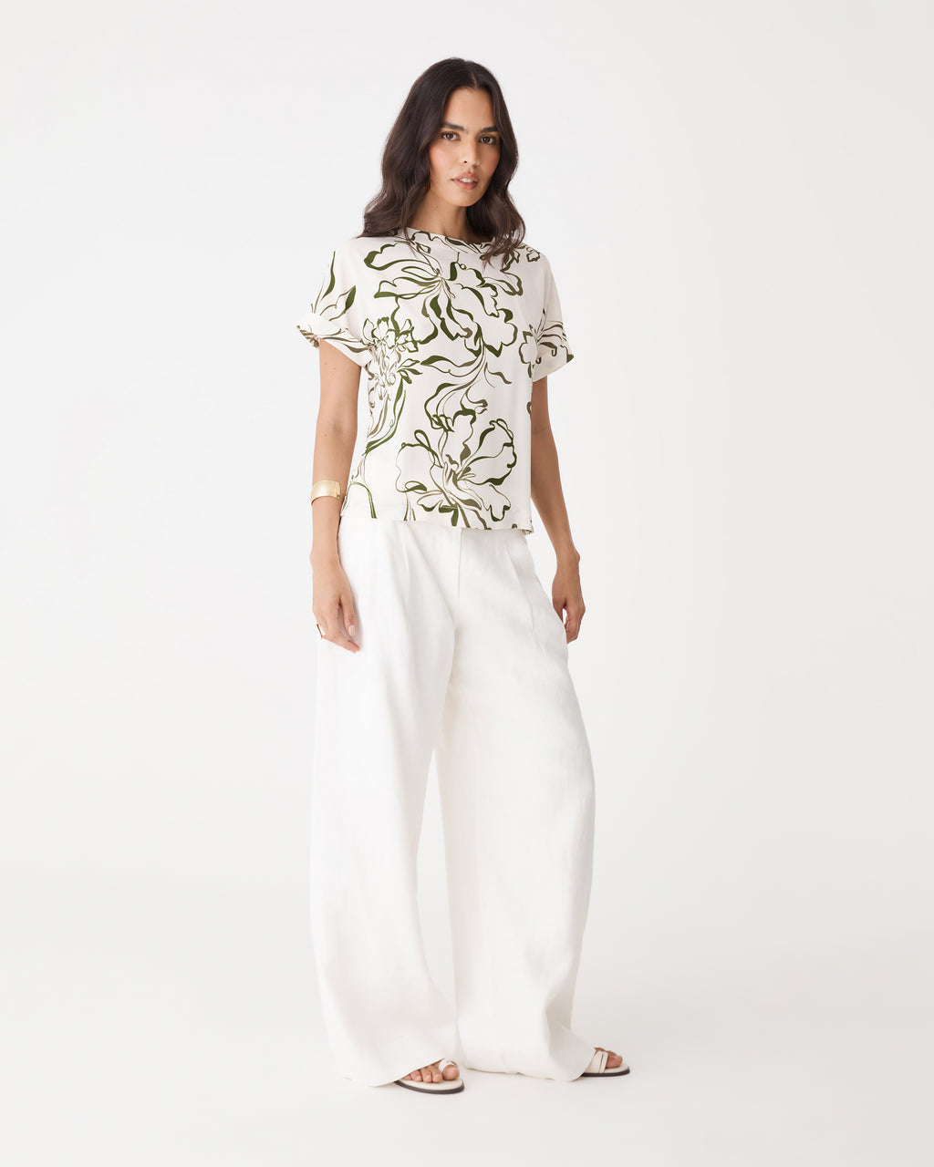 Front view of the cream and olive floral tee with short turned-up cuff sleeves